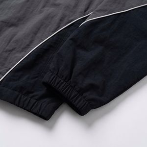 Chaqueta Deportiva con Paneles Negros y Color Carbón, Cierre Frontal con Cremallera — Cortavientos Ligero Unisex con Ribetes en Contraste |   Marca Privada OEM/ODM - Product Image 4