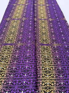 Tissu exclusif à imprimé cire africaine Togo en coton lisse pour vêtements et accessoires personnalisés avec de riches motifs traditionnels - Product Image 2