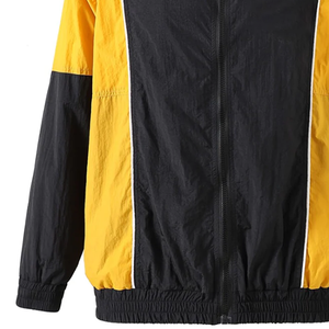 Veste coupe-vent imperméable Alpha noire, jaune et blanche, entièrement zippée, légère, en polyester, avec poches cachées et fermeture éclair - Product Image 4