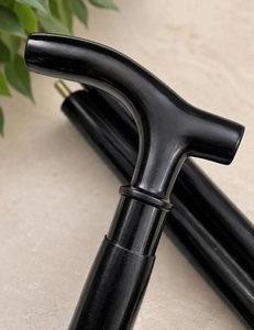 Elegant Black Walking Cane With Brass Accents And Floral Engraving For Gentlemen - Product Image 2