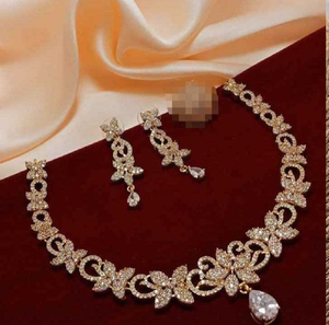 Luxurious multi-strand floral gold set with a <b>matching</b> ring and <b>bracelet</b>. Stunning craft, available at wholesale prices. - Product Image 4