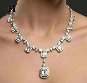 Juego de Joyería Nupcial de Lujo con Diamantes, Collar con Colgante de Oro Blanco de 14K con Corte Esmeralda y Pendientes Colgantes con Halo a Juego, Juego de Moissanita - Product Image 1