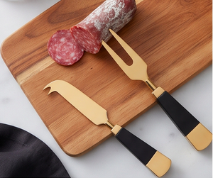 Cuchillo para queso de acero inoxidable dorado con mango negro y punta de tenedor para queso blando - Product Image 5