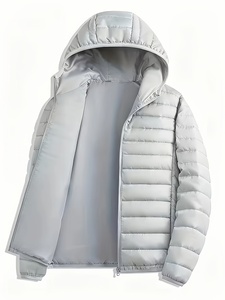 Blouson matelassé unisexe moderne avec isolation légère et chaude, fermeture éclair sur le devant, conçu pour un confort quotidien et les week-ends - Product Image 1