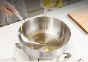 Sartén de acero inoxidable de alta resistencia, ideal para freír, saltear y tostar alimentos fácilmente. - Product Image 2