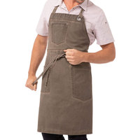 Tablier en toile de coton personnalisable avec poches pour outils, bretelles réglables, idéal pour la cuisine, la pâtisserie, le barbecue, les ateliers et les activités artisanales.