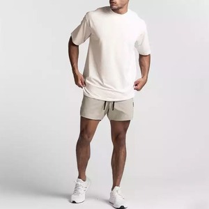 เสื้อยืดคอกลมสีดำสำหรับผู้ชาย ผ้าโพลีเอสเตอร์ 100% ระบายอากาศได้ดี พิมพ์ลายด้านหน้า ขนาดใหญ่พิเศษ น้ำหนัก 320gsm รับผลิตตามสั่งขายส่ง - Product Image 5
