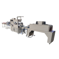 Machine d'emballage sous film rétractable pour rouleaux de papier toilette Maxi, personnalisable et automatique, certifiée CE, 0-10 m/min, 220V/380V