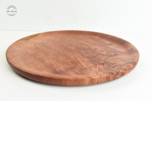Elegante plato redondo de madera hecho a mano Acabado natural Perfecto para servir y uso doméstico decorativo - Product Image 1