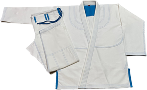 Conjunto de Karate Ligero para Entrenamiento con Tela de Algodón Suave, Diseño de Movimiento Flexible y Cinturón Rojo Brillante para Principiantes - Product Image 4
