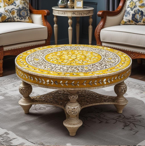 Mesa de centro redonda amarilla con incrustaciones de mosaico de hueso, con un estante inferior y patas a juego, disponible a precios de mayorista. - Product Image 1