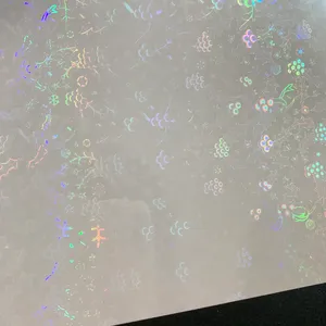 Película holográfica metalizada transparente autoadhesiva |   Elija su diseño |   12 pulgadas x 600 pulgadas (50 pies) - Product Image 1