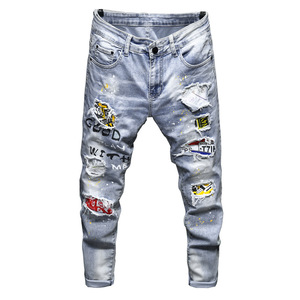 Jean slim homme en denim patchwork délavé style streetwear en coton mi-lourd pour l'automne - Product Image 1