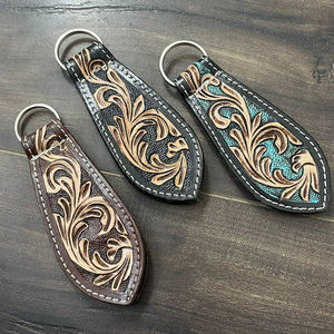 ที่หนีบหมวกแม่เหล็กทำจากหนัง2025ใหม่มีสายรัดหมวกแกะสลักลายดอกไม้ตะวันตกที่จับหมวกแม่เหล็กติดกระเป๋าและเข็มขัด - Product Image 5