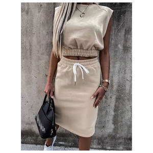 Conjunto de dos piezas para mujer 2026 al por mayor, sexy, casual, de verano, liso, con aberturas, sin mangas, con cordón, falda y top corto - Product Image 1