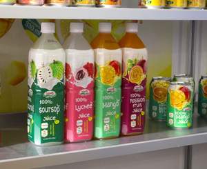 Hecho en Vietnam 1L Botella de PET Jugo real Muestra gratis OEM ISO HACCP Fabricante de bebidas-Soursop Litchi Passionfruit Juice - Product Image 3