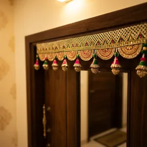 Elegant Golden Zari Embroidered Textile Border with Red and Green Tassels for Indian Wedding Decor - Product Image 4