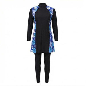 Ensemble de yoga 2 pièces imprimé papillon bleu avec finition dorée, body à col en V profond et jupe portefeuille longueur genou - Product Image 1