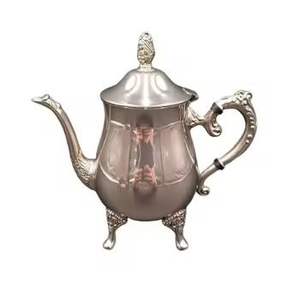 Théière en argent poli, détails ornés, bec courbé, poignée décorative, théière vintage, vaisselle élégante, objet de collection pour la maison - Product Image 2