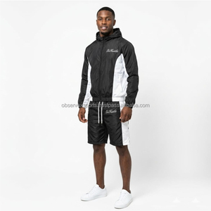 Conjunto Deportivo de Nylon con Logotipo Personalizado, Chaqueta y Pantalones Cortavientos de Poliéster - Product Image 1