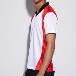 เสื้อโปโลคอวีเสื้อฟุตบอลเสื้อฟุตบอลเสื้อถักลายปักสีตัดกัน - Product Image 1