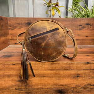 Chic Western Inspired Hair-on-Hide Leather Canteen Bag Premium Quality Fur Leather Circular Sling with Tassel & Zipper Closure - Product Image 5