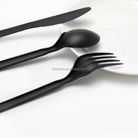 Umwelt freundliches schweres, schwarz-weiß verpacktes Einweg-Plastik messer und-gabeln Besteckset mit Serviette.