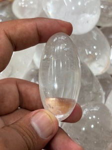 Piedra de cristal de cuarzo natural pulido Lingam para meditación, decoración espiritual, colección de bienestar y exhibición decorativa - Product Image 1