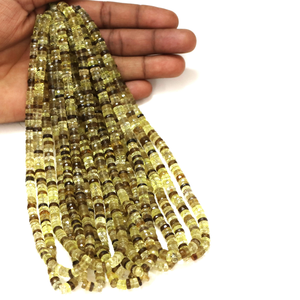 Cuentas Heishi facetadas de cuarzo limón bio de alta calidad con forma de neumático, cuentas de piedra preciosa facetadas de cuarzo limón bio natural con forma de rueda. - Product Image 1