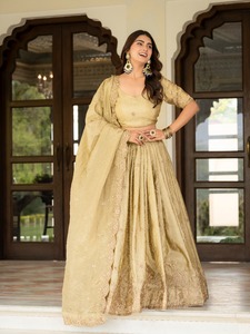 Atractivo Lehenga Choli de seda color crema con bordado de lentejuelas para boda - Product Image 1