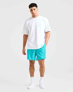 Shorts de bain pour homme en vert menthe uni, à séchage rapide, avec taille élastique et poches, shorts décontractés, shorts personnalisés pour homme, vêtements de sport - Product Image 3