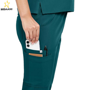 ชุดยูนิฟอร์มแพทย์สำหรับผู้หญิง - เสื้อโปโลแบบครอปติดซิปด้านหน้าและกางเกงขายาวทรงตรงพร้อมกระเป๋า 8 ช่อง ดูแลรักษาง่าย - Product Image 5