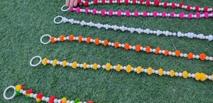 Guirlande artisanale écologique multicolore en tissu fileté avec pompons en coton, perles et clochettes dorées pour mur de mariage indien traditionnel - Product Image 5