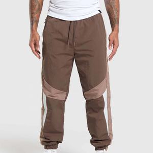 Conjuntos de Chaquetas Cortavientos de Nailon 100% Personalizadas al por Mayor para Hombre, Conjuntos Deportivos con Estilo Personalizado y Bordado - Product Image 4