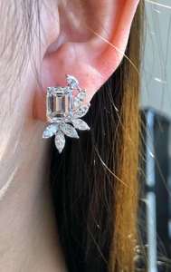 Radiant <b>emerald</b> solitaire <b>stud</b> <b>earrings</b> with marquise diamond accents in floral leaf setting refined luxury jewelry for women - Product Image 3