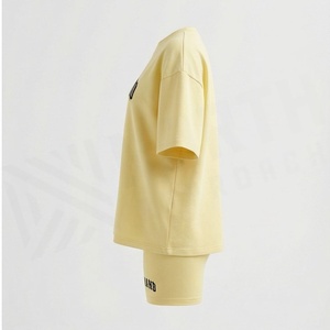 Nouvel ensemble 2 pièces pour femme, t-shirt ample à manches courtes et short au-dessus du genou, décontracté, printemps-été, jaune, en coton - Product Image 3