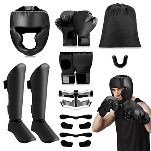 Set de 7 Piezas de Equipo de Entrenamiento de Boxeo que Incluye Protector de Cabeza, Guantes, Vendas para Manos, Protectores Bucales, Protectores de Espinillas, Protector Nasal y Bolsas de Almacenamiento - Product Image 1