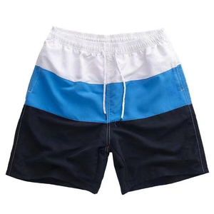 Shorts de Baño para Hombre de Secado Rápido con Bloques de Color Blanco, Azul y Negro, Poliéster, Corte Regular, Adulto - Product Image 1