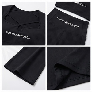 Ensemble de yoga 2 pièces North Approach : haut court noir uni à bretelles croisées et pantalon évasé taille haute - Product Image 4