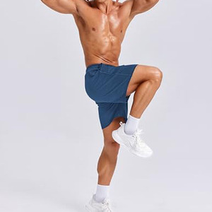 Shorts d'entraînement pour hommes, coupe athlétique avec matière respirante, favorisant la mobilité lors de la pratique du fitness ou dans les environnements extérieurs - Product Image 5