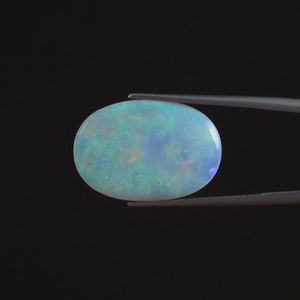 โอปอลสีขาวธรรมชาติจากโรงงานโดยตรง รับรองโดย IGI พลอยเม็ดเดี่ยว 9.31 กะรัต รูปไข่ 23x15.5 มม. ตัดด้วยมือ ขัดเงา ผ่านการเคลือบด้วยแว็กซ์/น้ำมัน - Product Image 1