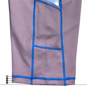 Shorts de yoga taille haute personnalisés pour femmes, avec surpiqûres contrastées, pour le sport et le fitness, style cycliste, avec doubles poches latérales, vente en gros OEM - Product Image 4
