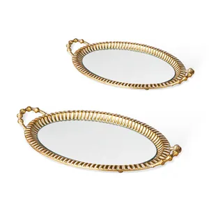 Plateau décoratif ovale en métal doré avec insert miroir et poignées, style glamour, fait main - Product Image 1