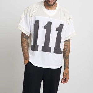 เสื้อฟุตบอลอเมริกันผ้าตาข่ายโพลีเอสเตอร์ 100% ระบายอากาศได้ดี แห้งเร็ว พิมพ์ลายดิจิตอลตามสั่ง คุณภาพดีที่สุด ปรับแต่งสีและโลโก้ได้ สายรัดแบบ T-Strap - Product Image 1