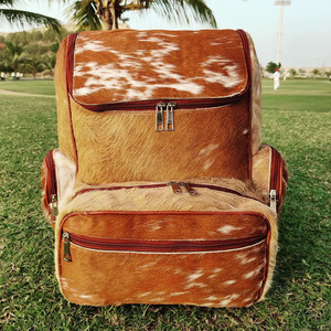 Premium cowhide leather hair on school <b>backpacks</b> wholesale supplier OEM custom handmade export student bags in wholesale price - Product Image 1