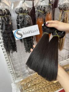 Top 2024 cheveux bruts en gros os droit naturel noir couleur vietnamien vierge faisceaux de cheveux humains extensions de trame - Product Image 3