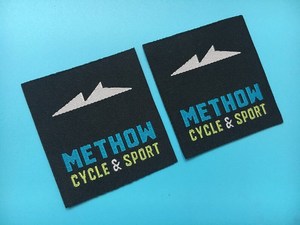 ป้ายผ้าฝ้ายทอสี่เหลี่ยมพิมพ์ลาย Methow Cycle & Sport ตัดด้วยเลเซอร์ ซักได้ สำหรับติดรองเท้า - Product Image 1