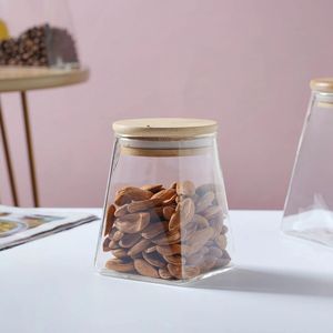 Pot en verre rond avec couvercle en bois, parfait pour le rangement de thé, café, sucre dans la cuisine et pour une utilisation décorative sur étagère. - Product Image 6