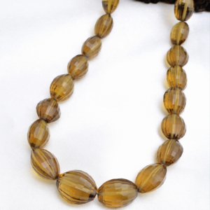 หินควอตซ์เบียร์ธรรมชาติทรงรีเหลี่ยมเพชรพลอย ขนาด 16 นิ้ว สำหรับทำเครื่องประดับชั้นดี 1 เส้น - Product Image 1