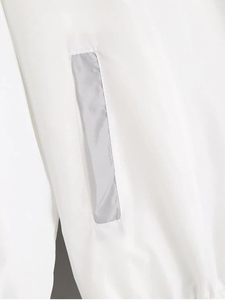 <b>Women</b> packable <b>windbreaker</b> jacket designed for convenient carrying and lightweight coverage during travel and outdoor adventures - Product Image 3